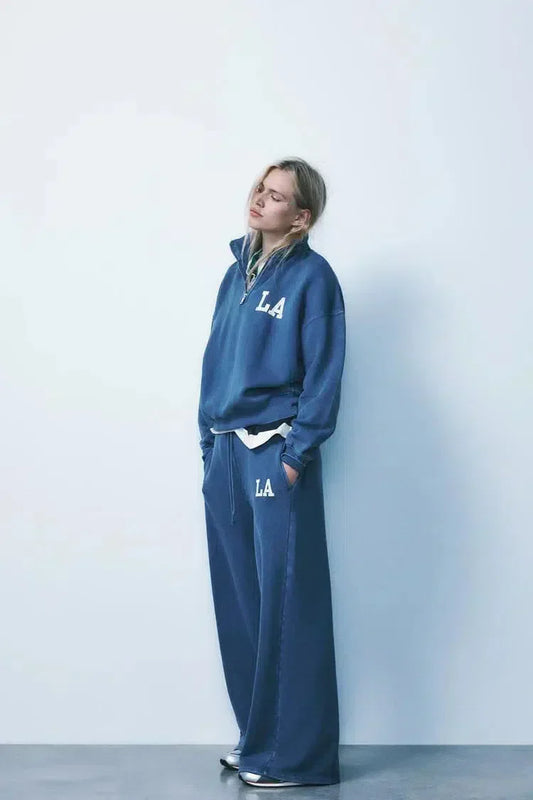 Damaris – Half-zip trui en broek met boorden – LA-loungeset