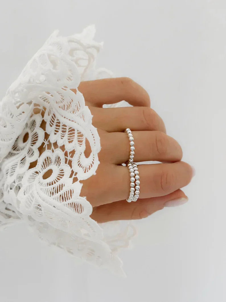 Minimalistische zilverkleurige kralenringen - Stapelbaar & verstelbaar