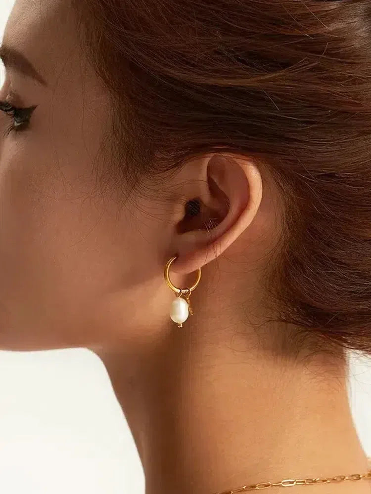 Parel oorbellen met ster - Klassiek en speels ontwerp