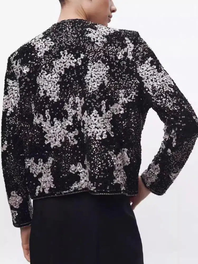 Viatrix – Sprankelend design – Pailletten jas