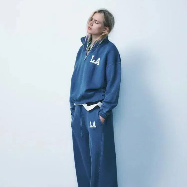 Damaris – Half-zip trui en broek met boorden – LA-loungeset