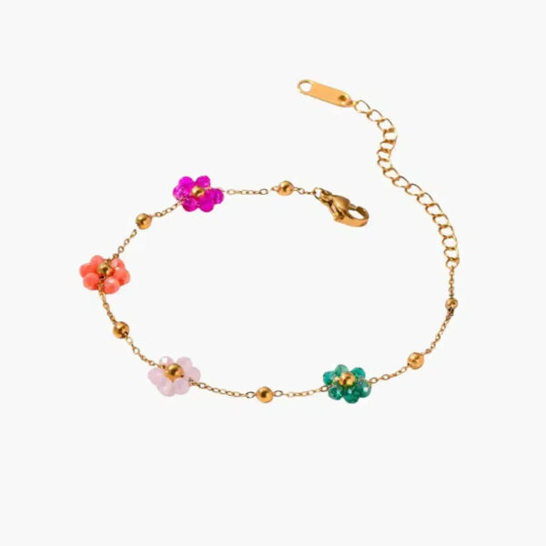 Goudkleurige bedelarmband met bloemenkralen - Verstelbare lengte